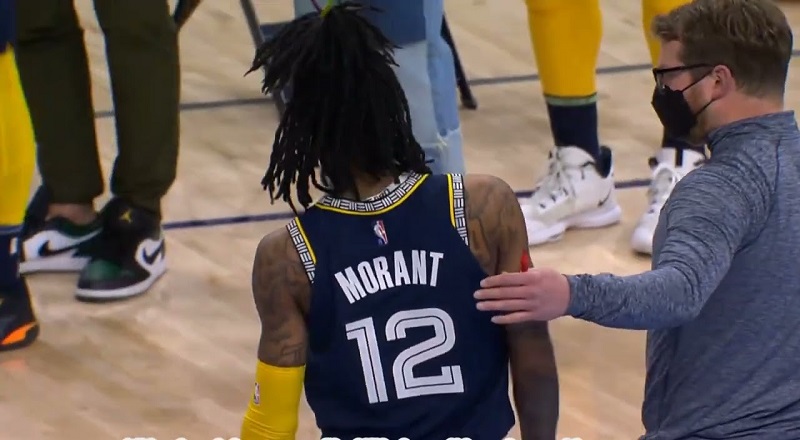 Ja Morant hurts his knee on Karl-Anthony Towns screen